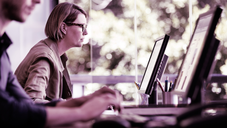 Man-and-woman-working-on-laptops-profile-Crocus-Thumbnail