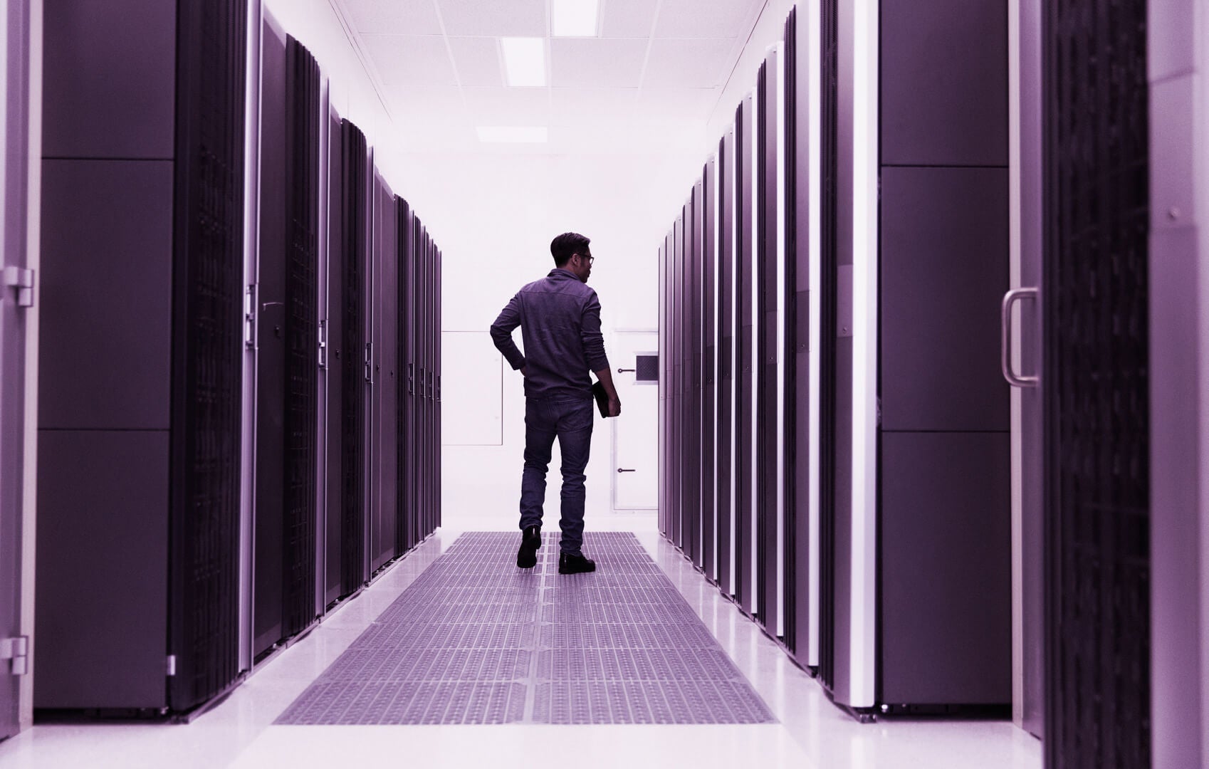 Technician-standing-in-server-room-Crocus_PPT